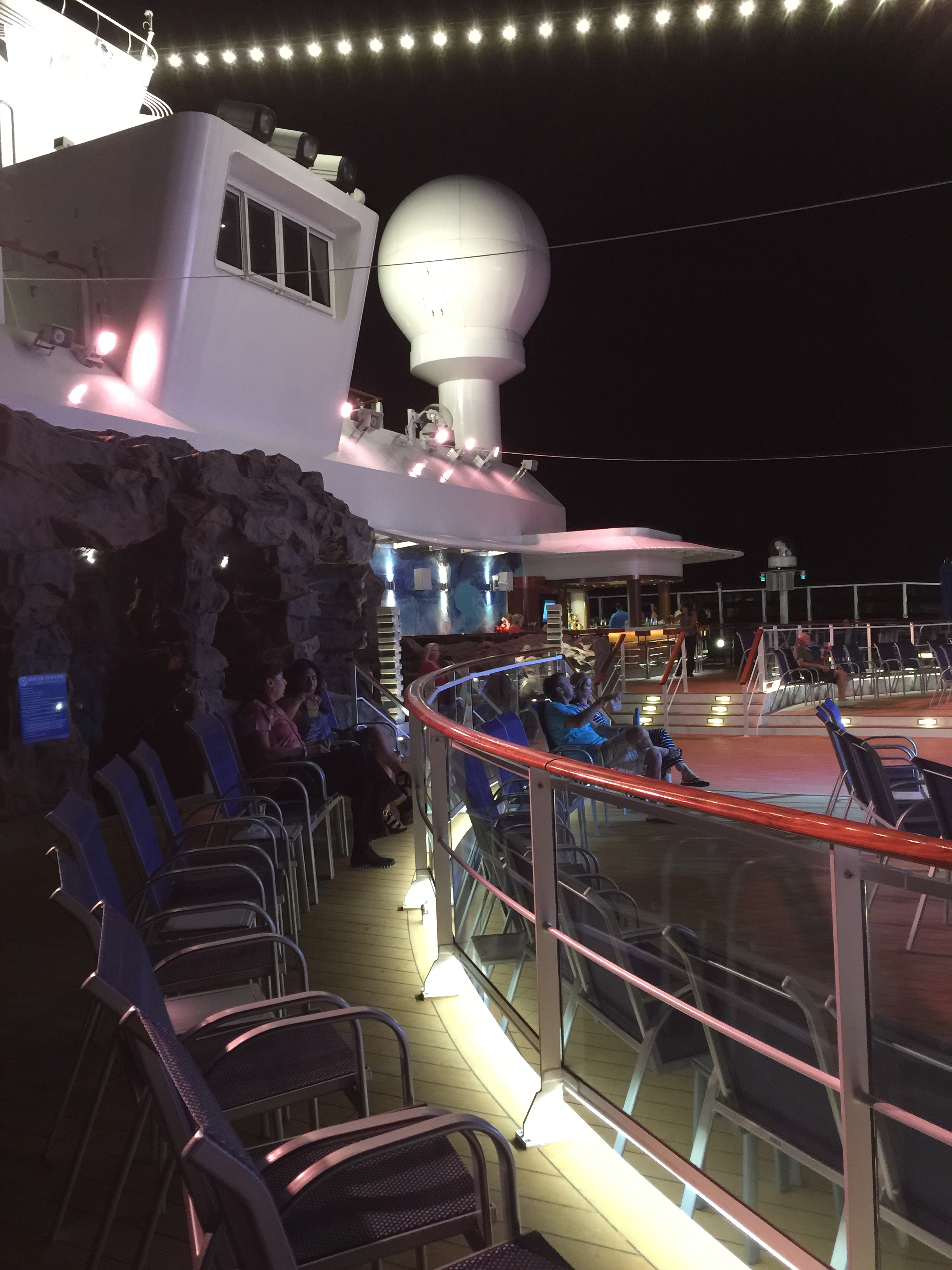 Norwegian cruises escape cruise ship aft night time