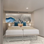 norwegianprima aft-facing penthouse suitewithlargebalcony-viewofbed-rendering