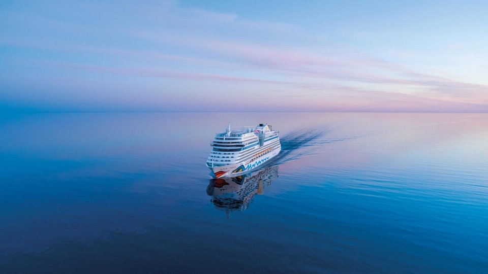 AIDA cruise AIDAcosma cruise ship sunset